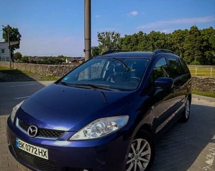 Синий Мазда 5, объемом двигателя 2 л и пробегом 255 тыс. км за 5800 $, фото 1 на Automoto.ua
