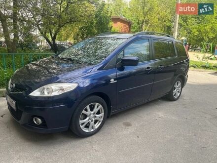 Синий Мазда 5, объемом двигателя 2 л и пробегом 248 тыс. км за 6800 $, фото 1 на Automoto.ua