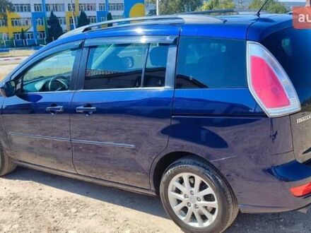 Синий Мазда 5, объемом двигателя 1.8 л и пробегом 220 тыс. км за 5700 $, фото 1 на Automoto.ua