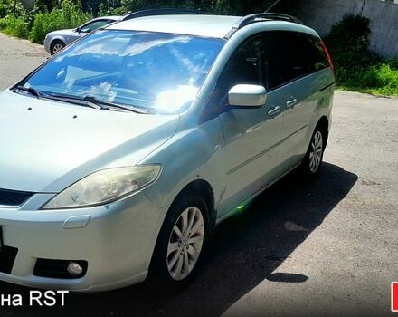 Синий Мазда 5, объемом двигателя 2 л и пробегом 350 тыс. км за 4200 $, фото 1 на Automoto.ua