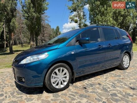 Синий Мазда 5, объемом двигателя 2 л и пробегом 200 тыс. км за 5500 $, фото 1 на Automoto.ua
