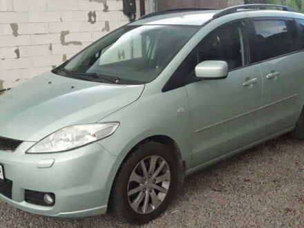Синий Мазда 5, объемом двигателя 2 л и пробегом 230 тыс. км за 6400 $, фото 1 на Automoto.ua