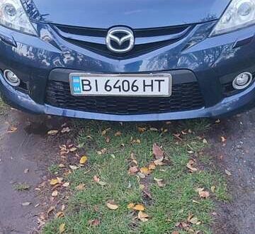 Синий Мазда 5, объемом двигателя 2 л и пробегом 322 тыс. км за 5700 $, фото 1 на Automoto.ua