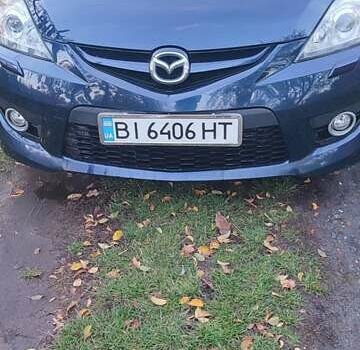 Синий Мазда 5, объемом двигателя 2 л и пробегом 322 тыс. км за 5700 $, фото 1 на Automoto.ua