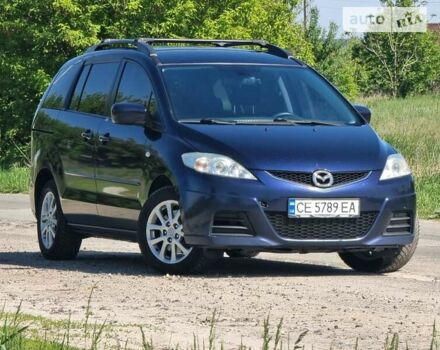 Синий Мазда 5, объемом двигателя 2 л и пробегом 302 тыс. км за 6700 $, фото 1 на Automoto.ua