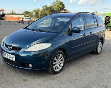 Синий Мазда 5, объемом двигателя 2 л и пробегом 299 тыс. км за 3305 $, фото 1 на Automoto.ua