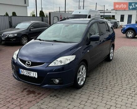 Синий Мазда 5, объемом двигателя 2 л и пробегом 239 тыс. км за 6500 $, фото 1 на Automoto.ua
