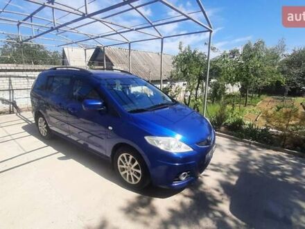 Синий Мазда 5, объемом двигателя 2 л и пробегом 300 тыс. км за 5900 $, фото 1 на Automoto.ua