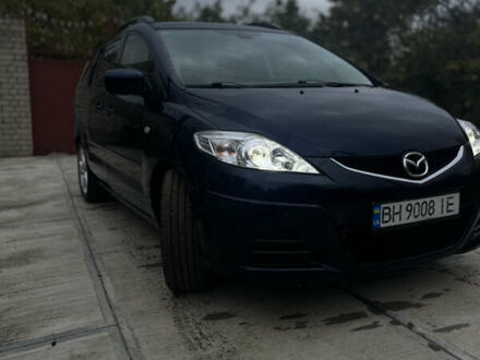 Синий Мазда 5, объемом двигателя 2 л и пробегом 363 тыс. км за 6100 $, фото 1 на Automoto.ua