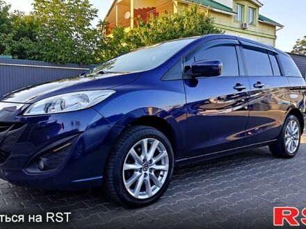 Синий Мазда 5, объемом двигателя 2 л и пробегом 256 тыс. км за 7700 $, фото 1 на Automoto.ua