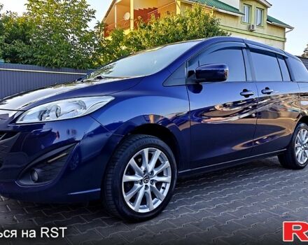 Синий Мазда 5, объемом двигателя 2 л и пробегом 256 тыс. км за 7700 $, фото 1 на Automoto.ua