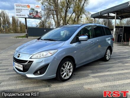 Синий Мазда 5, объемом двигателя 2 л и пробегом 216 тыс. км за 8899 $, фото 1 на Automoto.ua