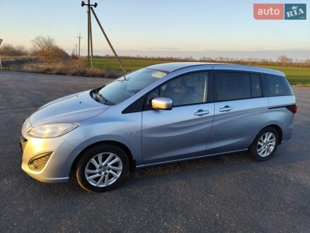 Синий Мазда 5, объемом двигателя 1.8 л и пробегом 98 тыс. км за 7400 $, фото 1 на Automoto.ua