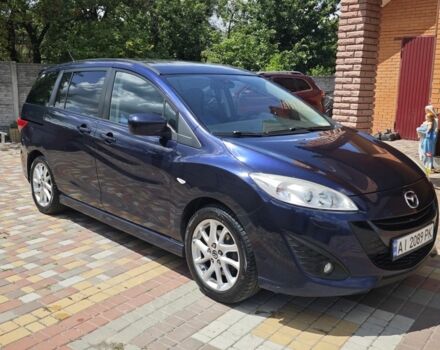 Синий Мазда 5, объемом двигателя 1.6 л и пробегом 250 тыс. км за 6200 $, фото 1 на Automoto.ua