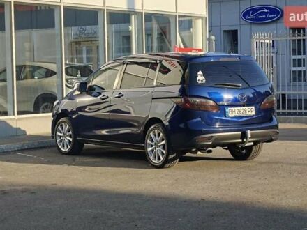 Синий Мазда 5, объемом двигателя 2 л и пробегом 242 тыс. км за 9800 $, фото 1 на Automoto.ua