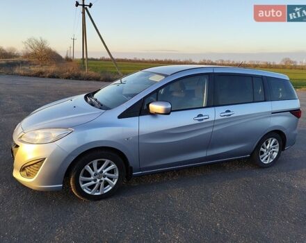 Синий Мазда 5, объемом двигателя 1.8 л и пробегом 98 тыс. км за 7500 $, фото 1 на Automoto.ua