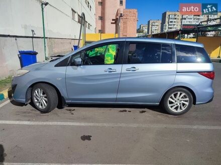 Синий Мазда 5, объемом двигателя 2 л и пробегом 106 тыс. км за 10050 $, фото 1 на Automoto.ua