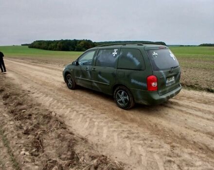 Зеленый Мазда 5, объемом двигателя 2 л и пробегом 300 тыс. км за 2600 $, фото 4 на Automoto.ua