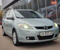 Зеленый Мазда 5, объемом двигателя 2 л и пробегом 251 тыс. км за 4800 $, фото 1 на Automoto.ua