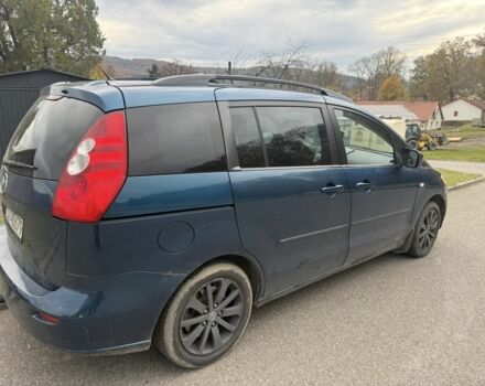 Зеленый Мазда 5, объемом двигателя 2 л и пробегом 310 тыс. км за 2000 $, фото 2 на Automoto.ua