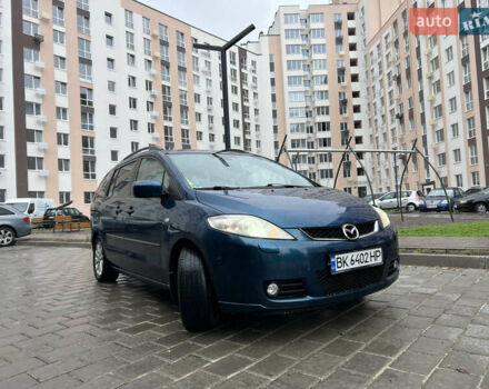 Зеленый Мазда 5, объемом двигателя 2 л и пробегом 243 тыс. км за 5350 $, фото 1 на Automoto.ua