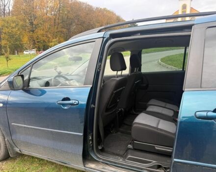 Зелений Мазда 5, об'ємом двигуна 2 л та пробігом 263 тис. км за 2000 $, фото 6 на Automoto.ua