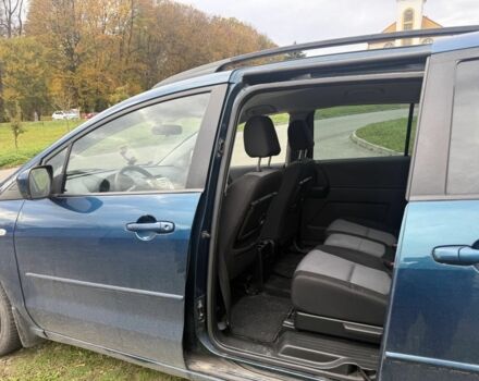 Зелений Мазда 5, об'ємом двигуна 2 л та пробігом 256 тис. км за 1990 $, фото 7 на Automoto.ua