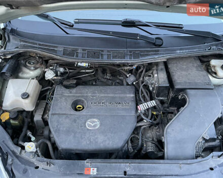 Зелений Мазда 5, об'ємом двигуна 2 л та пробігом 280 тис. км за 6000 $, фото 24 на Automoto.ua