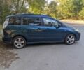 Зеленый Мазда 5, объемом двигателя 2 л и пробегом 250 тыс. км за 4942 $, фото 1 на Automoto.ua