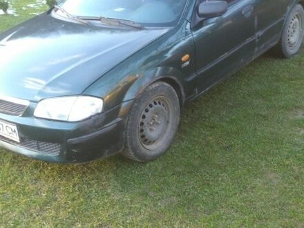 Зелений Мазда 5, об'ємом двигуна 1 л та пробігом 236 тис. км за 1500 $, фото 1 на Automoto.ua