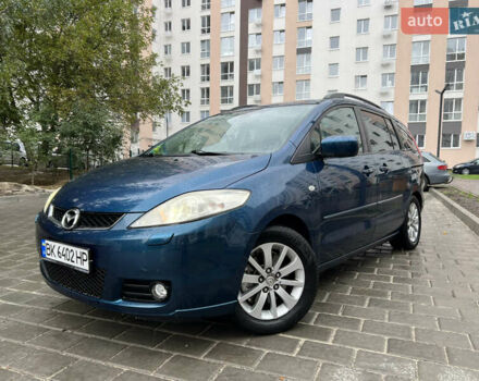 Зеленый Мазда 5, объемом двигателя 2 л и пробегом 243 тыс. км за 5350 $, фото 1 на Automoto.ua