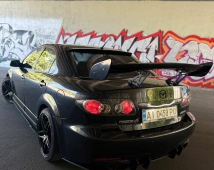 Черный Мазда 6 МПС, объемом двигателя 2.3 л и пробегом 205 тыс. км за 7400 $, фото 1 на Automoto.ua