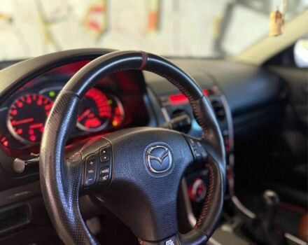 Черный Мазда 6 МПС, объемом двигателя 2.3 л и пробегом 205 тыс. км за 7400 $, фото 3 на Automoto.ua