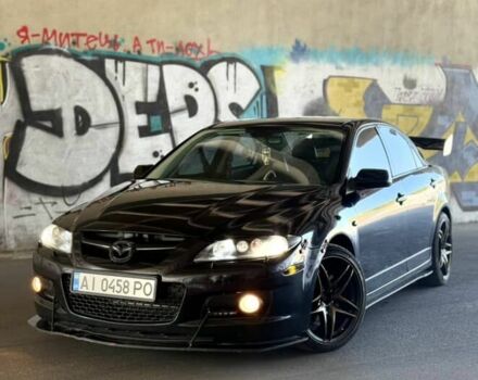 Черный Мазда 6 МПС, объемом двигателя 2.3 л и пробегом 205 тыс. км за 7400 $, фото 1 на Automoto.ua