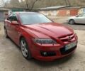 Красный Мазда 6 МПС, объемом двигателя 2.3 л и пробегом 188 тыс. км за 5000 $, фото 1 на Automoto.ua