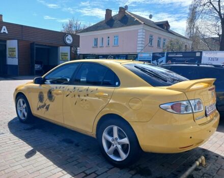 Желтый Мазда 6 МПС, объемом двигателя 2.3 л и пробегом 297 тыс. км за 4147 $, фото 5 на Automoto.ua