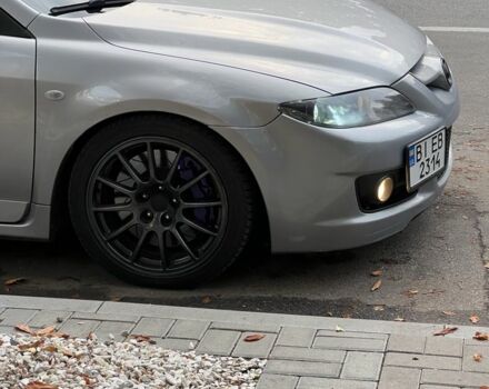 Серый Мазда 6 МПС, объемом двигателя 2.3 л и пробегом 200 тыс. км за 6900 $, фото 1 на Automoto.ua