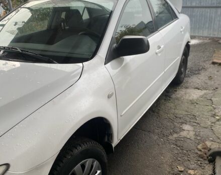 Белый Мазда 6, объемом двигателя 1.8 л и пробегом 165 тыс. км за 1064 $, фото 1 на Automoto.ua