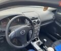 Белый Мазда 6, объемом двигателя 1.8 л и пробегом 167 тыс. км за 1800 $, фото 6 на Automoto.ua