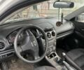 Белый Мазда 6, объемом двигателя 1.8 л и пробегом 165 тыс. км за 1064 $, фото 3 на Automoto.ua