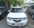 Белый Мазда 6, объемом двигателя 2.01 л и пробегом 270 тыс. км за 4800 $, фото 1 на Automoto.ua