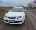 Белый Мазда 6, объемом двигателя 2 л и пробегом 240 тыс. км за 3999 $, фото 1 на Automoto.ua