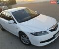 Белый Мазда 6, объемом двигателя 2 л и пробегом 189 тыс. км за 6100 $, фото 1 на Automoto.ua