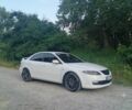 Белый Мазда 6, объемом двигателя 2 л и пробегом 235 тыс. км за 4156 $, фото 1 на Automoto.ua