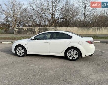 Белый Мазда 6, объемом двигателя 2 л и пробегом 317 тыс. км за 6500 $, фото 1 на Automoto.ua