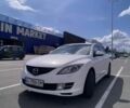 Белый Мазда 6, объемом двигателя 2 л и пробегом 251 тыс. км за 7013 $, фото 1 на Automoto.ua
