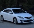 Белый Мазда 6, объемом двигателя 2 л и пробегом 210 тыс. км за 7200 $, фото 2 на Automoto.ua