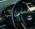 Белый Мазда 6, объемом двигателя 2 л и пробегом 300 тыс. км за 6750 $, фото 1 на Automoto.ua