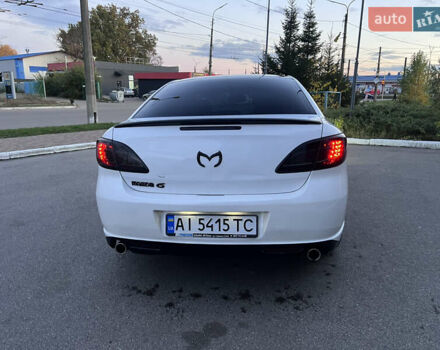 Білий Мазда 6, об'ємом двигуна 2 л та пробігом 266 тис. км за 6600 $, фото 7 на Automoto.ua
