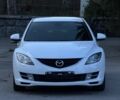 Белый Мазда 6, объемом двигателя 2 л и пробегом 210 тыс. км за 7200 $, фото 1 на Automoto.ua